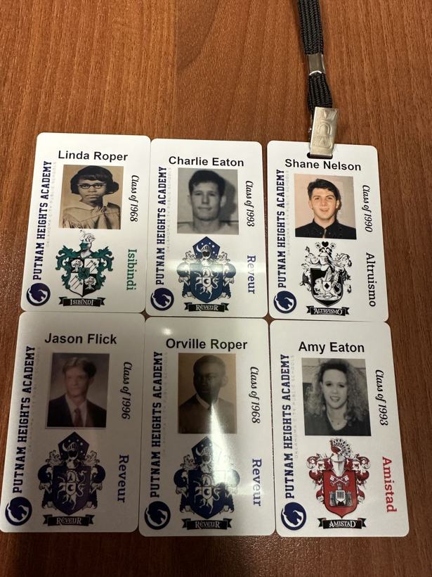 Six staff ID badges with throwback high school photos and house crests.